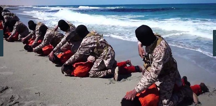 IS briefly takes center of Libyan city, beheads 12